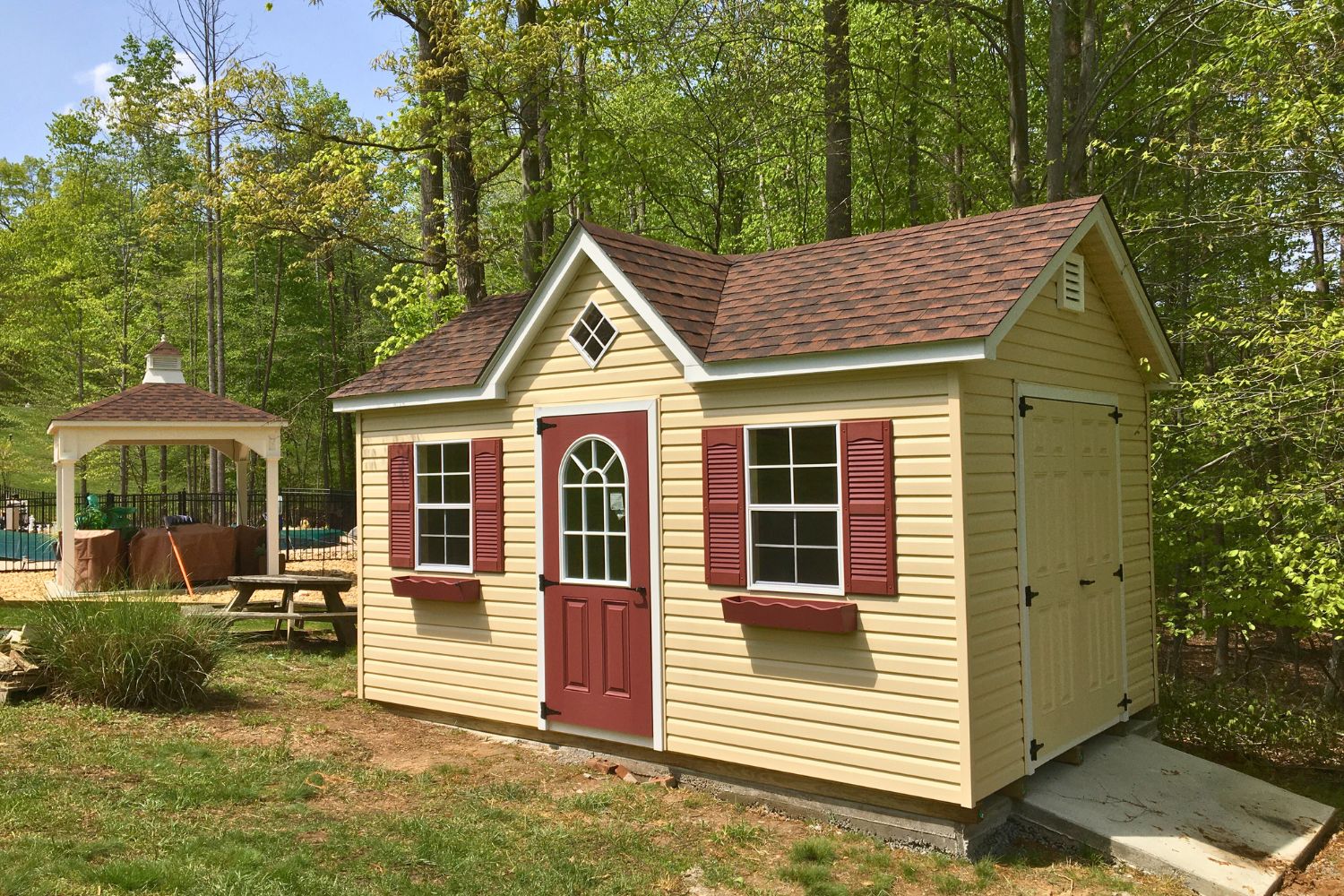 10x16 Vinyl Cape Cod Shed 1 10x16 Vinyl Cape Cod Shed in full backyard with ramp