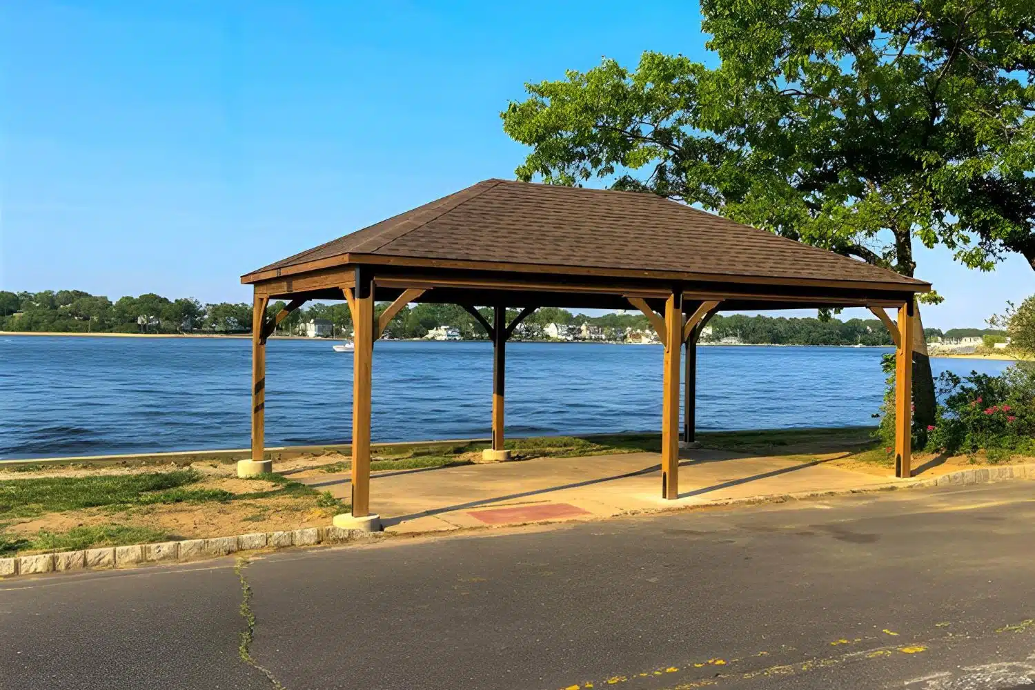 Lakefront Wooden Pavilion in front of lake with concrete foundation