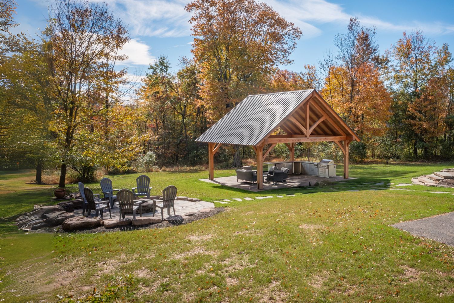 The Kingston Pro Pavilion 2 The Kingston Pro Timber Frame Pavilion in backyard at distance