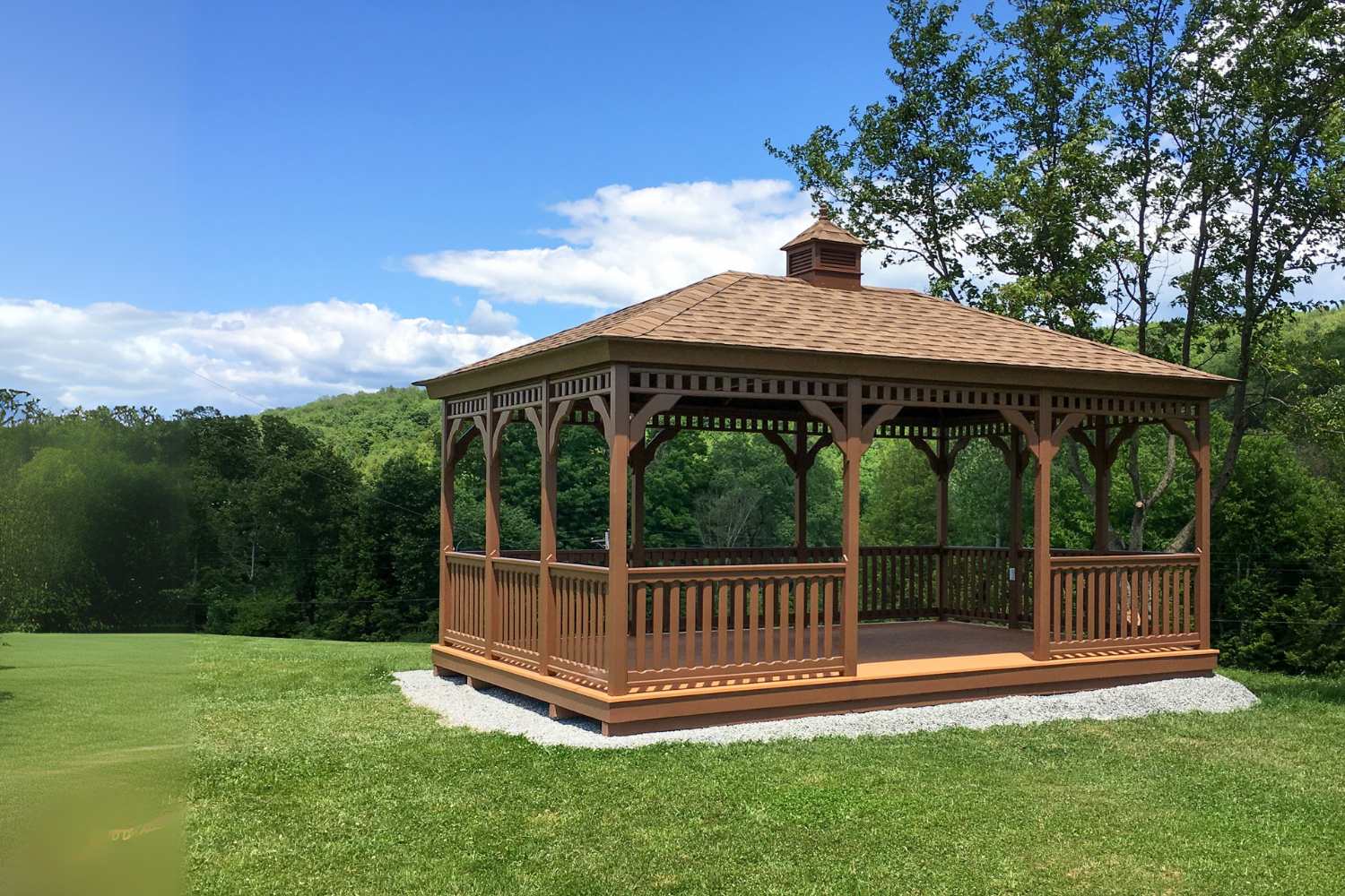 Wood Rectangle Gazebo on gravel with cupola
