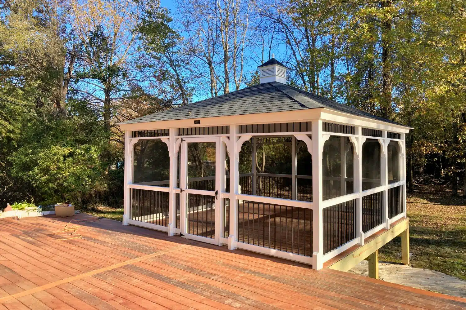 Vinyl Rectangle Gazebo on deck with screen